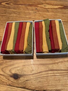 2 Tag Linen-like Cocktail Napkin Set (8 each) in Red, Gold, Orange, and Olive